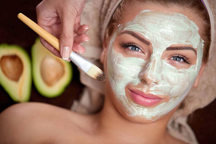 Applying a face mask for home rejuvenation